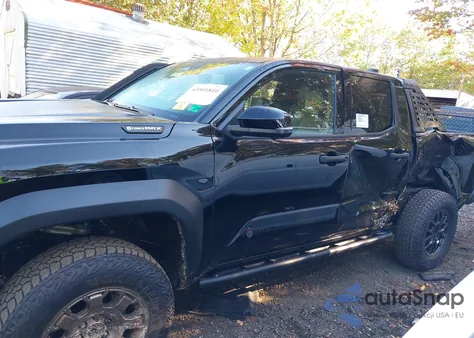 2025 Toyota Tacoma Hybrid Trailhunter from USA, damaged, VIN 3TYLC5LN0ST039894